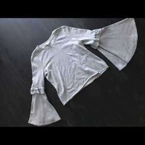 Candie’s gray sweater